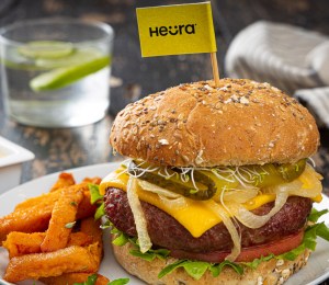 A vegan Heura burger on a plate